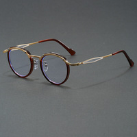 Vente en gros en Chine de lunettes de vue optiques anti-lumière bleue avec monture en métal et verres ronds ultralégers