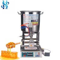 Machine de remplissage pneumatique de liquides visqueux 33L avec balance pour le remplissage de miel, de pâtes et de sauces