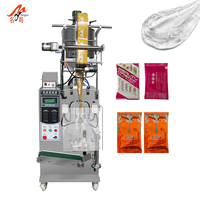 Machine d'emballage verticale entièrement automatique pour sachets scellés sur quatre côtés, pour liquides (gel douche, shampoing, après-shampoing)