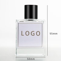 Flacon de liquide de parfum d'aromathérapie en verre de luxe vide et transparent de 50ml avec bouchon noir et logo personnalisé