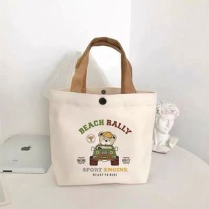 Sac fourre-tout en toile à motif de dessin animé mignon avec fermeture à fermoir, portable et réutilisable, idéal pour le déjeuner d'été, les étudiants, le bureau, les pique-niques et le rangement quotidien - Product Image 1
