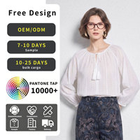 Chemise à col rond de style artistique français pour femmes, avec un design ample et amincissant, haut polyvalent à manches longues