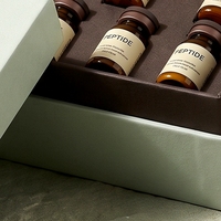 Boîte rigide personnalisée avec couvercle et base verts pour flacons de peptides, 9 flacons, impression offset sur éponge, quatre couleurs