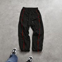 Rainbow Spray Athletic Nylon Trainings hose Fallschirm hose Herren Kurz geschnittene Sport hose mit rotem Rand Detail Wind breaker Jogging hose