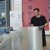 Machine de scellage automatique avancée Jiade pour sacs en rouleau avec système de balancement pour une efficacité élevée