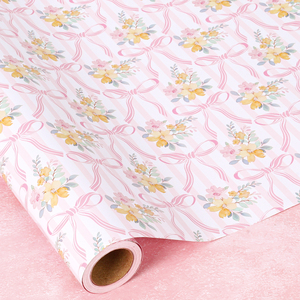 Papel de regalo reciclable con lazo rosa claro y pequeñas flores para decoración de cajas de regalo en fiestas de cumpleaños y despedidas de soltera. - Product Image 1