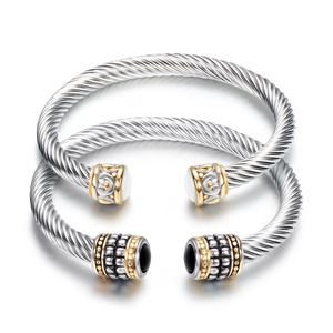 Bracelet en fil torsadé bicolore en acier inoxydable, or et noir, bijoux de mode unisexe - Product Image 1