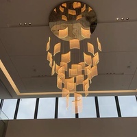 Grand lustre pour bâtiment duplex, villa, hall d'hôtel, éclairage de salon, département des ventes, lustre long de luxe pour escalier en carrelage