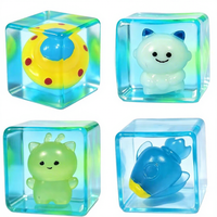 Vente en gros de jouets anti-stress en TPR qui brillent dans le noir, en forme de cube de glace monstre, avec logo personnalisé pour enfants et adultes