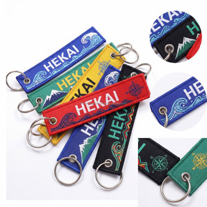 Etiqueta Tejida Personalizada para Llavero con Bordado, Logotipo y Nombre Personalizados, Diseño de Brújula y Flecha para Aventuras al Aire Libre - Product Image 5