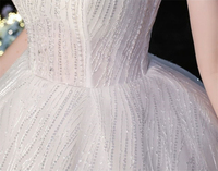 Robe de mariée de style féerique en dentelle perlée à paillettes, broderie à col licou, longue traîne, robes de mariage