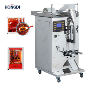 Remplisseuse de liquides électrique automatique contrôlée par PLC pour bouteilles en plastique et sachets – Remplissage de boissons et d'huiles – Haute automatisation - Product Image 1