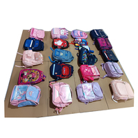 Venta al por mayor de mochilas escolares usadas de alta calidad en fardos de mochilas de segunda mano para niños de marca original