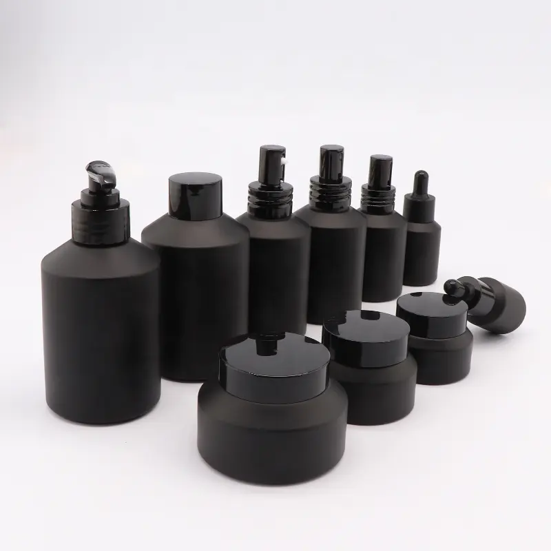 Luxury 30ml Matte Black Frosted Amber Cosmetics Cream Glass Dropper Bottles And Jars With Lotion Spray Pump For Serum Packaging