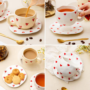 Chaozhou Ceramic <b>Tea</b> <b>Cup</b> <b>And</b> <b>Saucer</b> Set White Heart Pattern Round Shape For Afternoon <b>Tea</b> 2024 Design - Product Image 1
