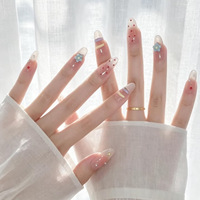 Approvisionnement direct usine Faux ongles en résine bleue, motif fleur, ligne contrastante, pois, diamant, ODM