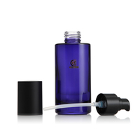 Flacon pompe pour fond de teint en verre à épaule plate bleu foncé de 100 ml de haute qualité avec bouchon noir mat