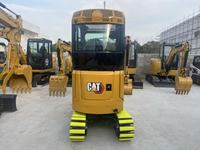 Excavatrice d'occasion Cat CAT302 de 2 tonnes, 90% neuve, d'origine, avec certifications EPA et CE, pour usage agricole, à bas prix.
