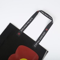 Bolsa de PVC Gris Oscuro Personalizada con Correa Negra y Diseño Floral Transparente para Regalos y Empaquetado Minorista