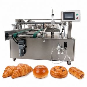 Machine automatique de glaçage pour pains Chelsea et de brossage de surface liquide pour tresses basques, pour la production en usine alimentaire et en cuisine centralisée - Product Image 1