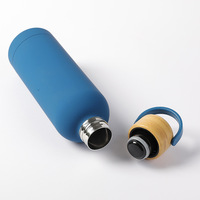 Nouvelle gourde de sport d'extérieur au design moderne, avec poignée portable et couvercle en bambou, isolée sous vide, personnalisable avec LOGO