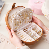 Nouveauté, boîte à bijoux en cuir PU ovale à deux étages, faite à la main, personnalisée, étanche, avec bouton, portable, multifonction, multicolores