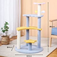 Petit arbre à chat multi-niveaux avec griffoir, lit rond sur la perchoir supérieure et jouet pompon suspendu pour chatons et chats d'intérieur
