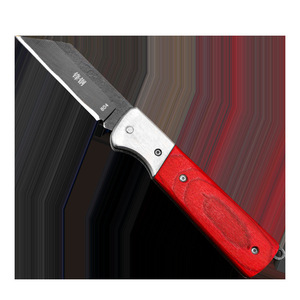 Cuchillo de injerto plegable Kyushu Garden con mango rojo y hoja de acero para poda de árboles frutales - Product Image 1