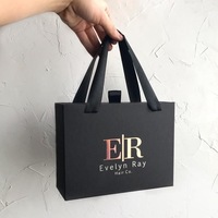 Sac en papier personnalisé noir mat avec poignée en ruban pour vêtements, cosmétiques, bijoux, boutique de vêtements, cadeaux