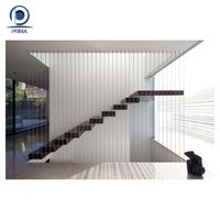 Optima Escalier droit flottant avec supports en porte-à-faux cachés et balustrades en verre pour maisons contemporaines Escaliers
