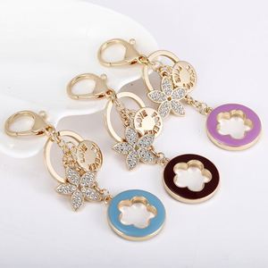 Nouveau porte-clés de voiture en alliage avec strass et motif trèfle à cinq feuilles porte-bonheur, pendentif créatif, cadeau - Product Image 1