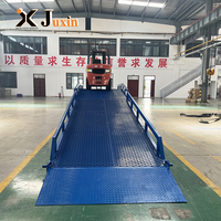 Rampe de chargement mobile économique pour usine, pont d'accès hydraulique mobile à bon rapport qualité-prix pour déchargement de conteneurs par chariot élévateur