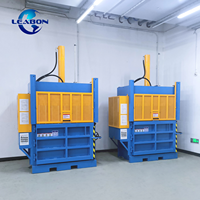 Presse à balles hydraulique verticale à double cylindre compacte avec moteur et roulement pour le compactage de déchets plastiques, fibres, vêtements et canettes