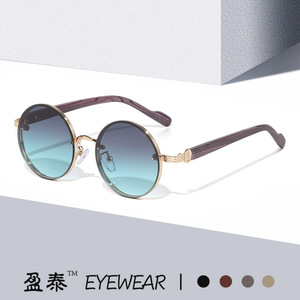 Gafas de sol con montura redonda de metal UV400 para hombre estilo punk a la moda - Product Image 1
