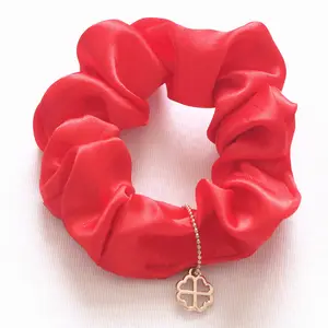 Cheap Solid Red Satin Elastic Hair Mini New Design Scrunchies With Gold Plated Metal Lucky Flower Charm