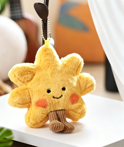 Il Ciondolo Peluche a Forma di Girasole Sorridente <span class=keywords><strong>è</strong></span> un Morbido Portachiavi a Forma di Fiore Cartoon per Borsa. <span class=keywords><strong>È</strong></span> un adorabile piccolo peluche. - Product Image 1