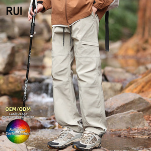 Pantalon de randonnée softshell imperméable et à séchage rapide pour homme RUIQUWIN, léger, écologique, taille élastique, poches cargo, coupe classique - Product Image 1