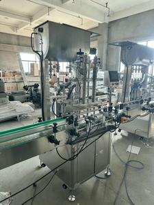 Máquina automática de llenado de pasta líquida para bebidas de desbordamiento, 2 boquillas, capacidad de 1000BPH para estuches de bolsas de plástico para productos químicos - Product Image 4