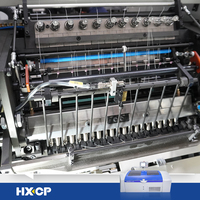 HX180 Nouvelle machine à coudre robotisée multi-stations de reliure de livres à couverture rigide, pilotée par vision, avec alimentation automatique et précision optimisée