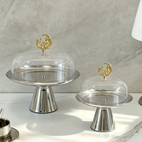 Support à gâteau élégant et écologique en acier inoxydable de luxe avec couvercle en acrylique transparent et bouton sculpté doré pour la présentation de desserts