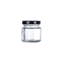 Vente en gros de petits, moyens et grands bocaux hexagonaux en verre pour bonbons, dessert, confiture de miel, bocal de stockage avec couvercles