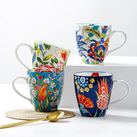 Tasse à café en porcelaine de Chine en gros avec motif personnalisé, design floral intégral et anse