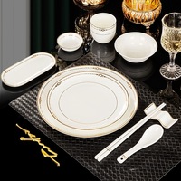 Service de vaisselle moderne et minimaliste en céramique haut de gamme de Jingdezhen avec incrustations dorées, comprenant bols, sous-plats et assiettes, spécial pour hôtels, restaurants et cadeaux, vente en gros