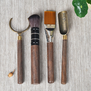 Accesorios para la ceremonia del té Kung Fu, juego de cuatro piezas, herramientas para el té con mango de madera para el té de la tarde - Product Image 1