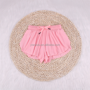 Vente en gros mode 2 en 1 jupe de yoga pour enfants 2023 nouvelle jupe de tennis pour enfants shorts de sport solides personnalisés pour filles avec poches - Product Image 3