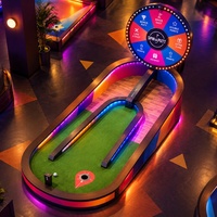 Jeu de golf interactif avec roue des prix colorée, défi de mini-golf, solution tout-en-un pour la location d'événements en parc d'attractions intérieur