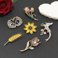 Broches XUPING en gros pour cadeaux de mariage, accessoires de mode papillon, fleur, perle, grande épingle, broches animales pour femmes