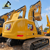 Excavatrice sur chenilles hydraulique Caterpillar 320GC d'occasion de 20,5 tonnes avec flèche, cabine d'opérateur et benne pour travaux routiers