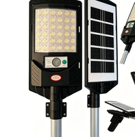 Lampu Jalan Tenaga Surya Terpadu All In One Sensor Gerak Manusia PIR Kontrol Jarak Jauh IP65 Tahan Air ABS 5000K Cahaya Siang untuk Luar Ruangan