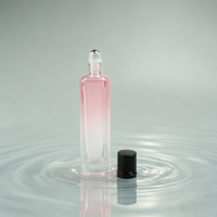 Flacon de parfum rond en verre borosilicate de 15 ml avec pulvérisateur à pompe et diffuseur à bâtonnets, fond épais, surface sérigraphiée mate